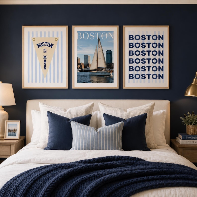 Boston wall art set of 3 featuring a vintage Boston pennant print, Boston sailboat skyline photography, and blue striped Boston typography poster in light wood frames.
