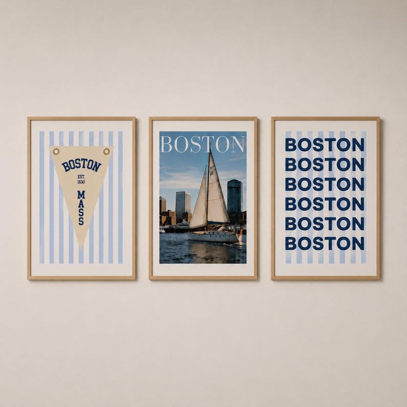 Boston wall art set of 3 featuring a vintage Boston pennant print, Boston sailboat skyline photography, and blue striped Boston typography poster in light wood frames.