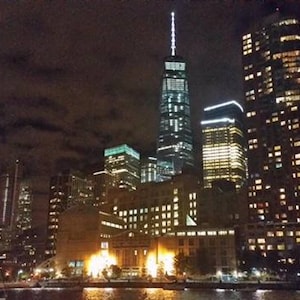 Lower Manhattan Skyline At Night From Pier 25.