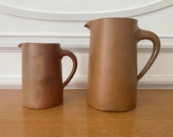 Sandstone pitchers set of 2 old French vintage sandstone pitchers