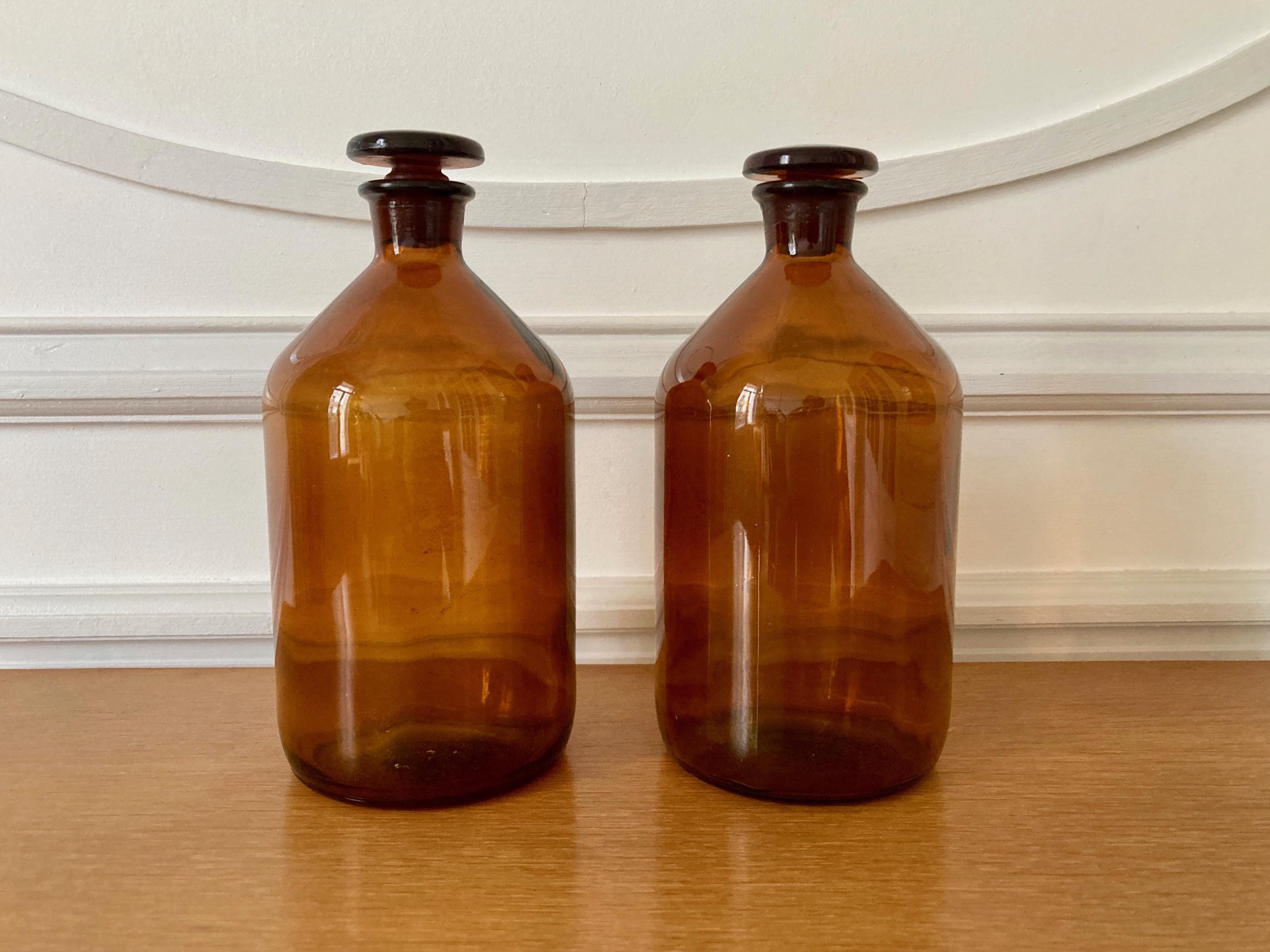 Vase bouteille soliflore verre soufflé ambré signé Claude MORIN