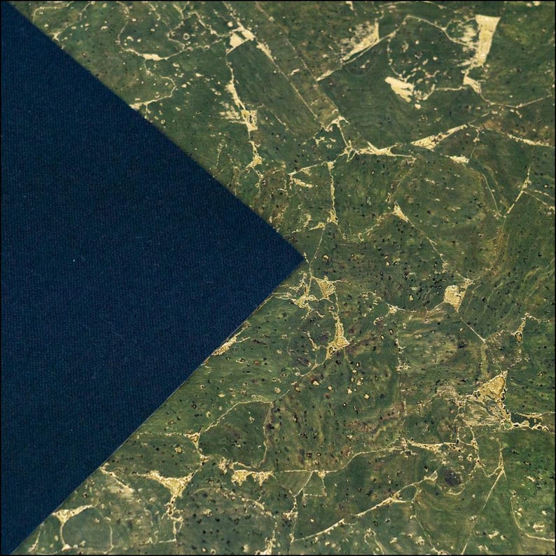 May include: Abstract square image with a dark navy blue triangle overlapping a green and gold patterned surface. The surface has a marbled appearance with irregular shapes and textures.