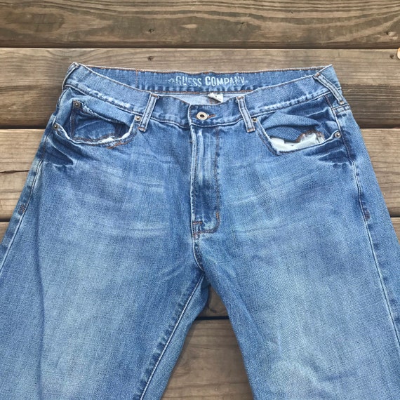 Guess top jeans company