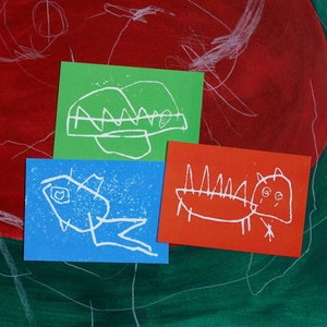 Lot de 3 cartes postales : deux dragons et un poisson linogravure