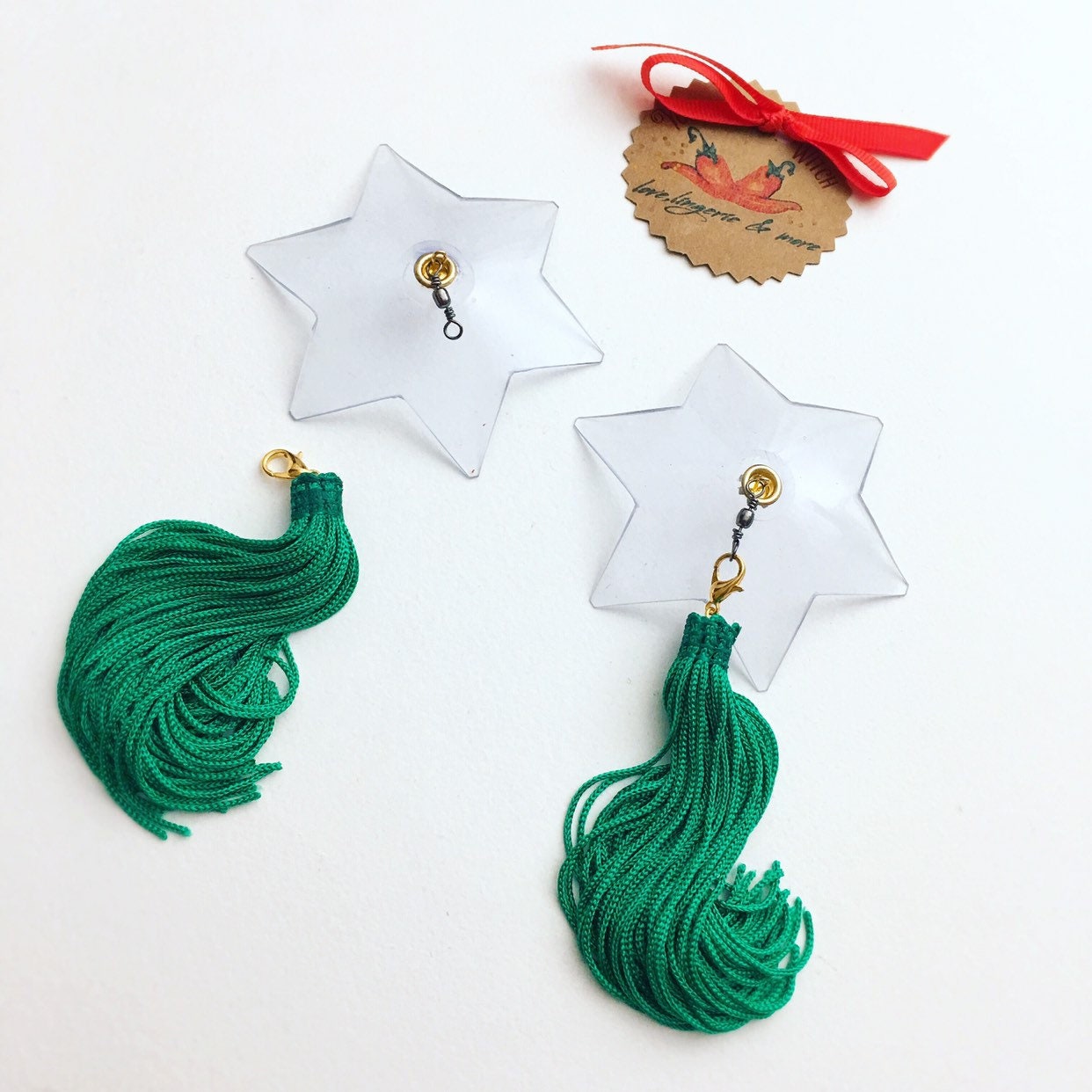 Bases de pezones de gelatina con borlas de seda