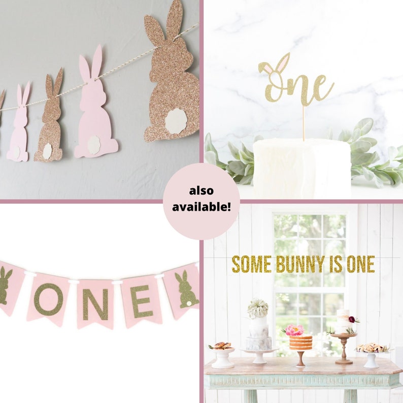 May include: Pink and gold glitter bunny banner with the word "ONE" in gold glitter. Also included is a gold glitter cake topper with the word "ONE" and a banner that says "SOME BUNNY IS ONE".