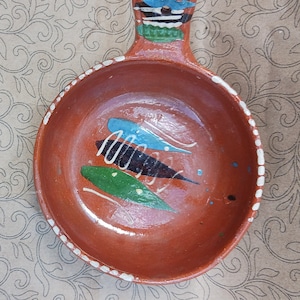 Mexican Tonala pottery bowl with handle 5 inch