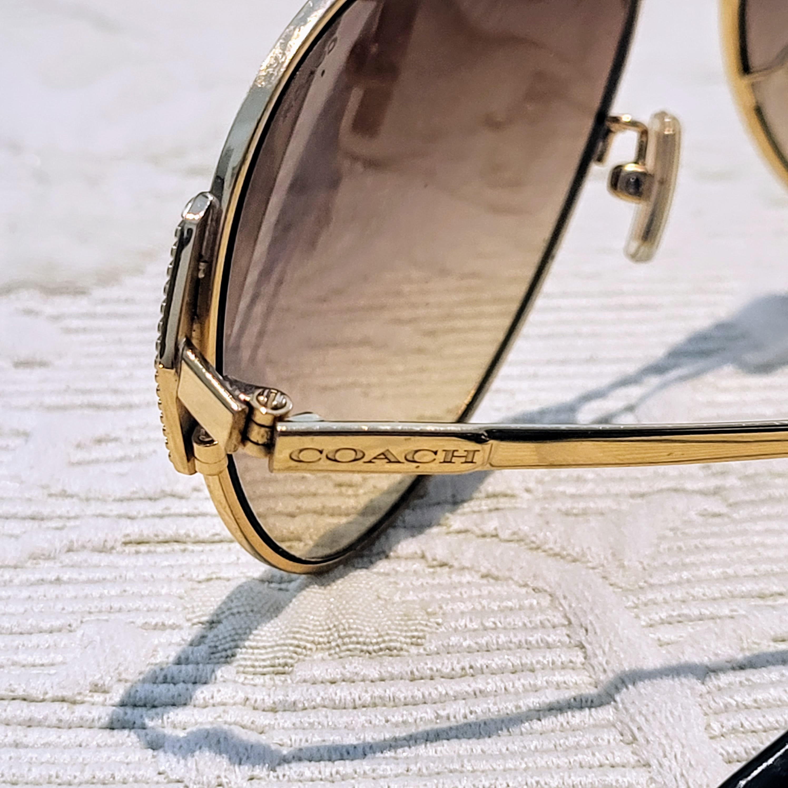 Coach Gold Aviators Sunglasses Coach HC7169 CW193 | Free Shipping | Glasses.com® main image 2