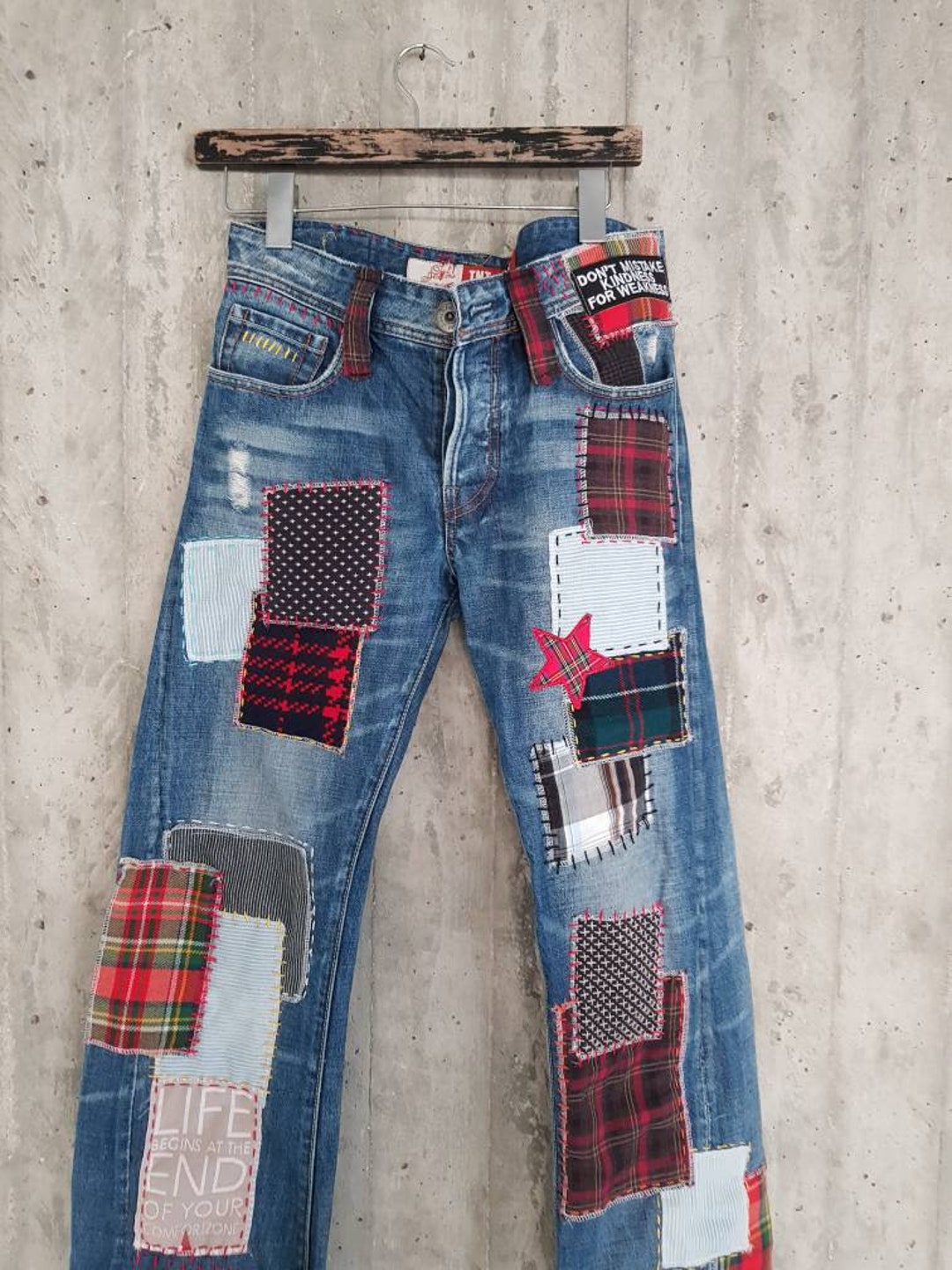 Jeans with store colorful patches