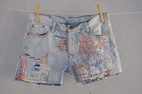 Distressed cut hotsell off jeans