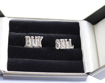 Gemelos de plata de ley con la inscripción "Comprar/Vender" - Joyería para operadores de bolsa