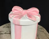 Ceramic White and pink bow ribbon planter with metal enameled lid hanger. Teleflora, made in China.