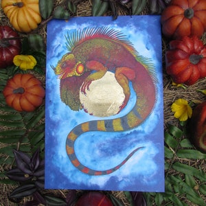 Dios iguana, embellecido con papel de aluminio