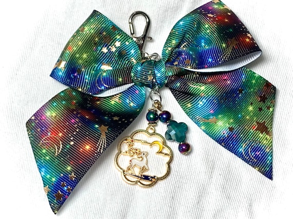 Dazzling bow charm with dark night sky ribbon and Japanese style enamel deer pendant. Unique eye candy to embellish your planner or bag!