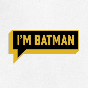 May include: A yellow and black speech bubble with the text "I'M BATMAN" in black.