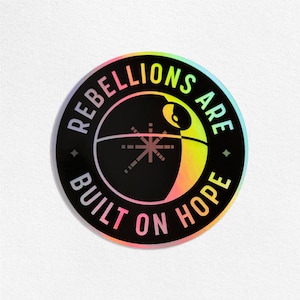 Rebellions Are Built On Hope Holo Sticker