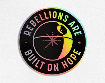 Rebellions Are Built On Hope Holo Sticker