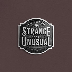 Strange & Unusual Enamel Pin