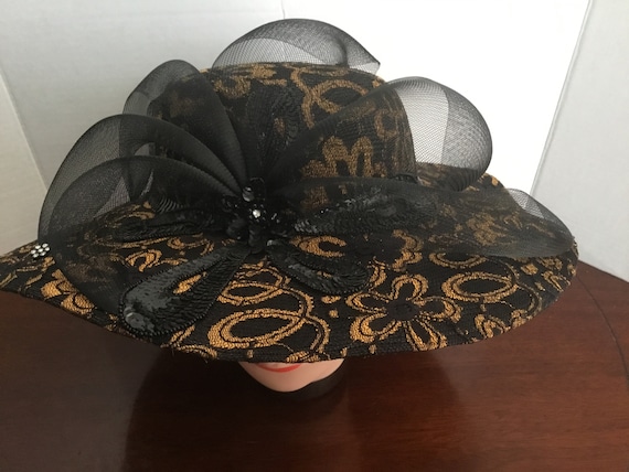One of Mr HI’S classic wide brimmed hat, straw lik