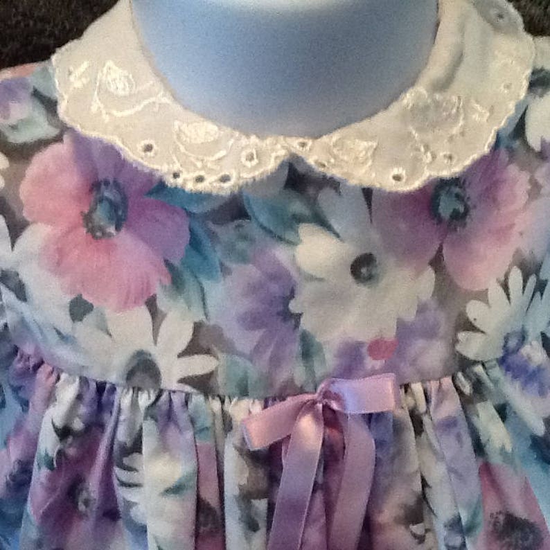 purple and green flowers for Easter or that cool spring or summer day. white filled with pink A beautiful bold coloured flowered dress
