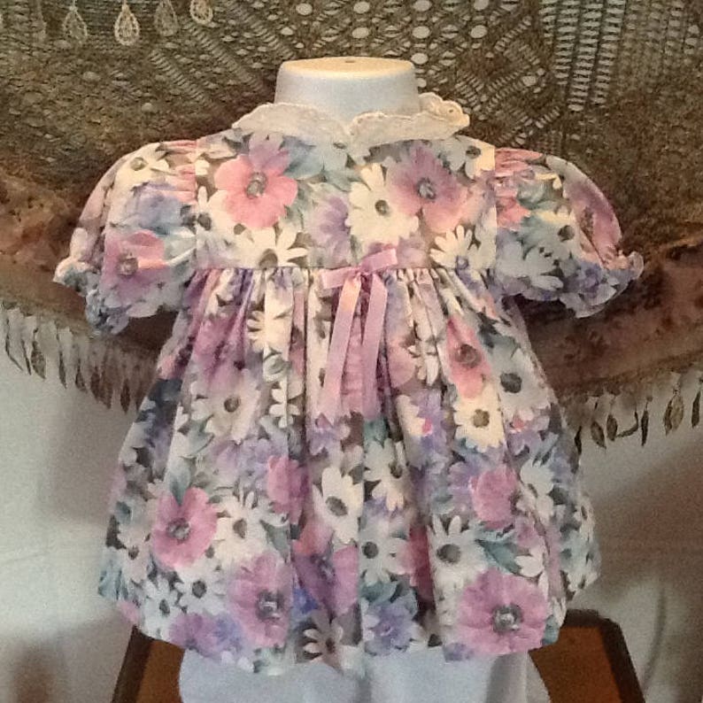 purple and green flowers for Easter or that cool spring or summer day. white filled with pink A beautiful bold coloured flowered dress