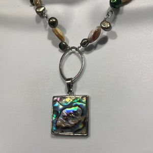 Mother of Pearl Medallion with small Shell and mother of pearl beads linked Necklace