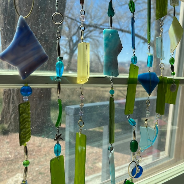 window Decor of Colorful stain glass chunks and beach glass with glass beads