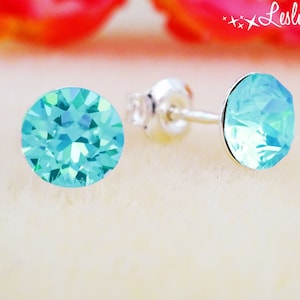 Boucles D'oreilles Pendantes Argentées Avec Pierre Bleu Marine Et Strass