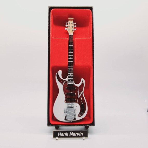 hank marvin guitar action strings