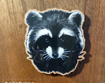 Magnet of a Watercolor Raccoon portrait printed on wood