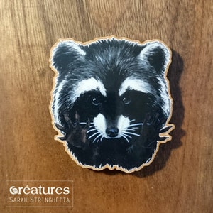 Magnet of a Watercolor Raccoon portrait printed on wood