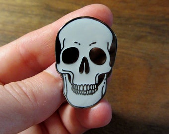 Human skull enamel pin