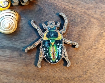 Magnet of a Spotted Flower Beetle printed on wood