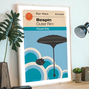 May include: A retro-style poster for Star Wars: The Empire Strikes Back featuring a blue and white illustration of Cloud City, a space station in the Outer Rim, with the text "Star Wars, Bespin, Outer Rim, Cloud City".