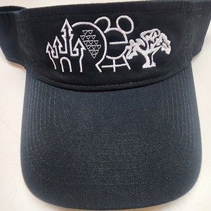 May include: Black visor with white embroidered images of a castle, a roller coaster, a sphere with triangles, and a tree. The text "Disney" is embroidered on the visor.