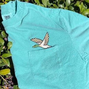 Mallard Duck flying out of pocket Embroidered shirt SHORT Sleeve Comfort Colors, Embroidered UNISEX Pocket Tee Shirt