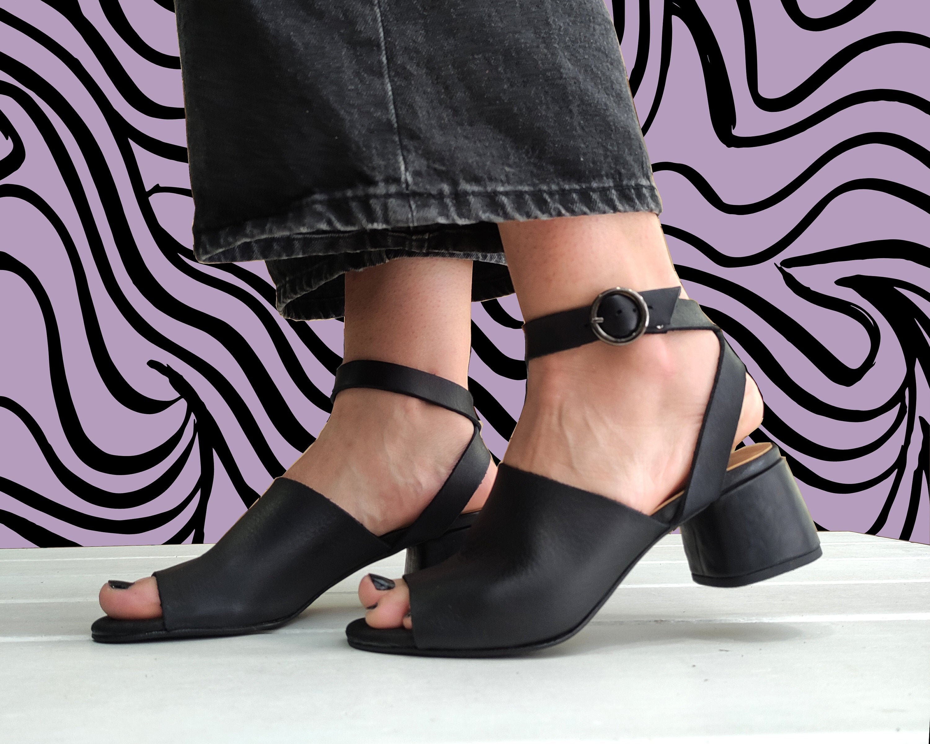 black leather high heel mules