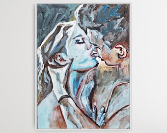 May include: An abstract painting in cool tones of blue, white, and brown, depicting two figures in an embrace. The artwork shows a close-up of two faces, with one figure's arm around the other. The painting is framed in a white border.