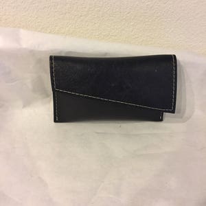 CALYPSO/Small black leather clutch