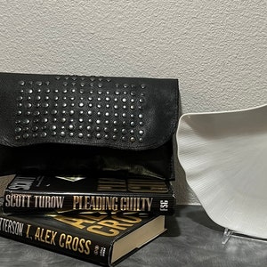 CALLA LILLY/black leather clutch