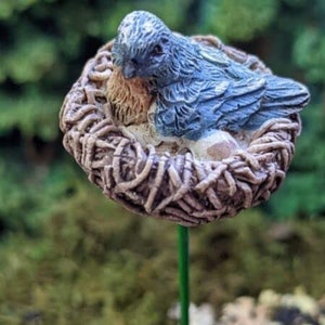 Miniature Fairy Garden Mama Bird sitting on her nest of eggs, width 1 inch c/w 5 inch pick,