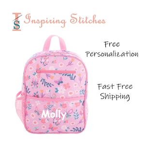 May include: Pink backpack with a floral and butterfly pattern. The backpack has a top handle, a front zippered pocket, and a side mesh pocket. The name "Molly" is printed on the front. The text "Inspiring Stitches" is at the top.