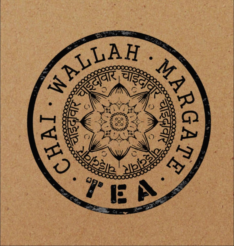 May include: Black and white circular stamp with the text "Chai Walla Margate Tea" around the edge. The center of the stamp features a black and white mandala design with the text "चाइदावार" repeated around the edge.