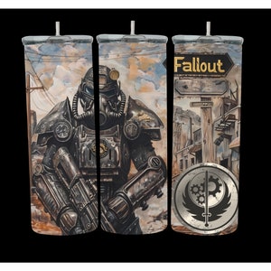 May include: A stainless steel tumbler with a Fallout themed design. The tumbler features a character in power armor, a wasteland scene, and the Fallout logo.