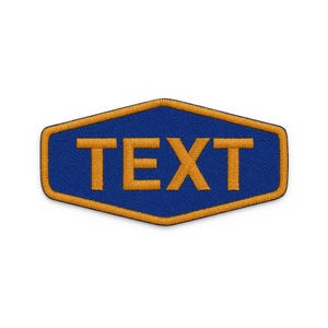May include: A hexagonal embroidered patch featuring a deep blue background with a thick golden-yellow border. The word TEXT is stitched in the center in a matching golden-yellow thread, using a bold, sans-serif font style throughout the design.