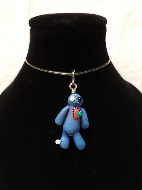 blue voodoo doll
