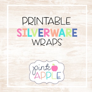 May include: Printable silverware wraps with a pink apple logo and the text "pink apple" in a white frame on a light wood background.