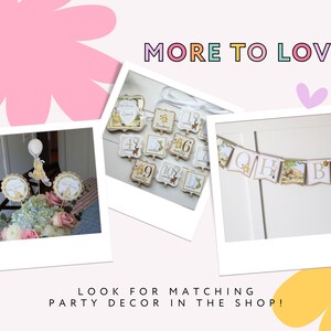 K&ouml;nnte beinhalten: Partydekorationen mit Winnie Puuh-Motiv. Das Bild zeigt Tischdekorationen, Zahlenkarten und ein Banner. Der Text "MORE TO LOVE" und "LOOK FOR MATCHING PARTY DECOR IN THE SHOP!" sind ebenfalls sichtbar.