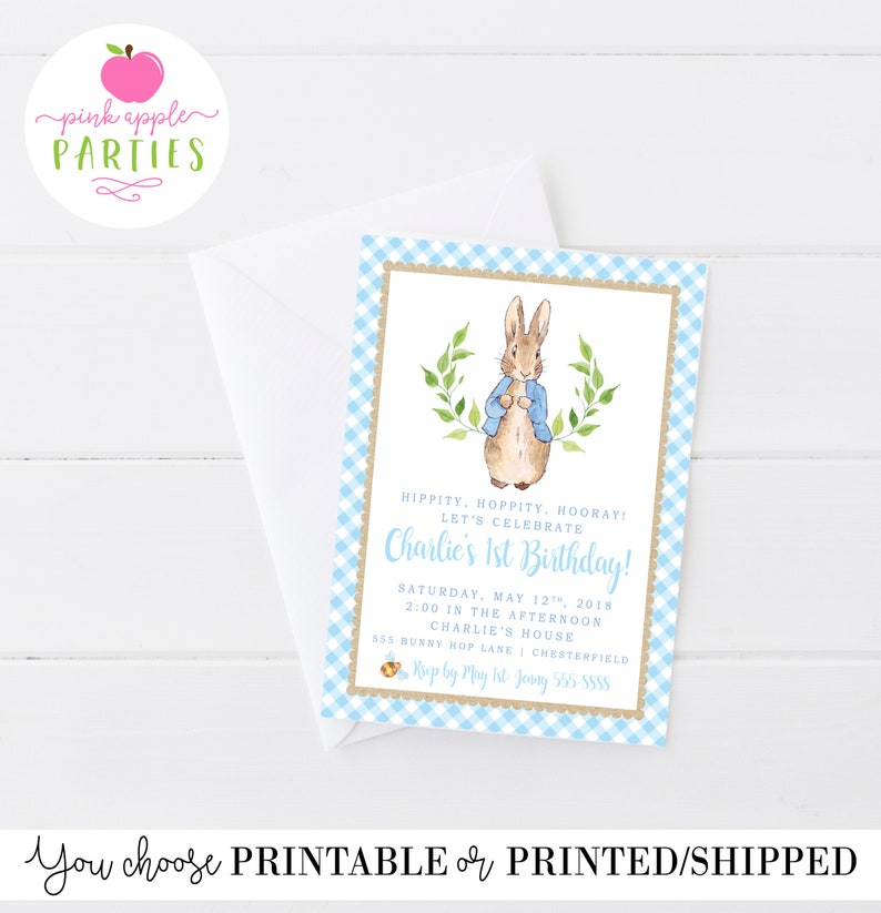 May include: A blue and white gingham patterned invitation with a brown border. The invitation features a watercolour illustration of Peter Rabbit wearing a blue jacket. The text on the invitation reads "Hippity, Hoppity, Hooray! Let's Celebrate Charlie's 1st Birthday!"  The invitation also includes the date, time, and location of the party.