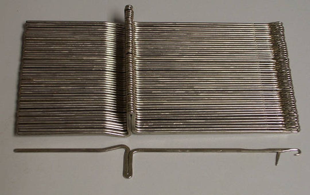 Knitting Machine Needles Photos, Images and Pictures